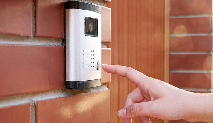 Smart doorbell for home security mounted on wall