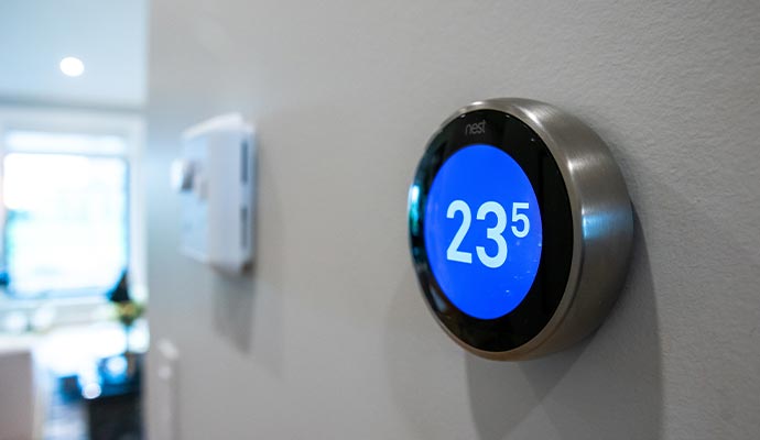 An installed nest thermostat