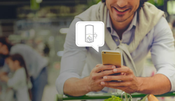 a person Locking door using smartphone