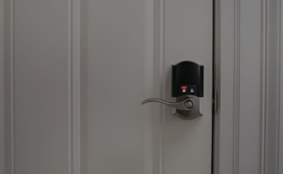 schlage encode smart wifi lever installed on a door