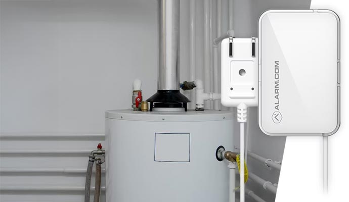 Water heater with an Alarm.com leak detection sensor attached