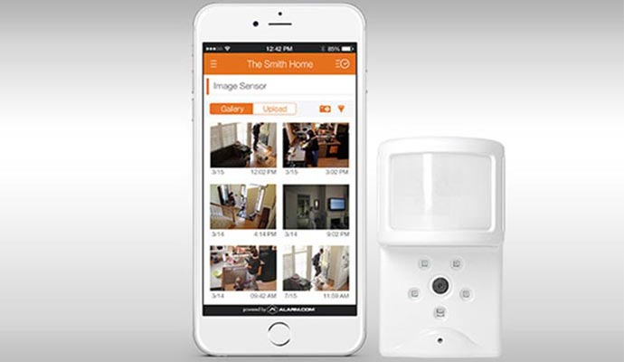 Burglar monitoring device paired with a mobile phone