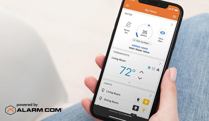 Person using smart home monitoring app
