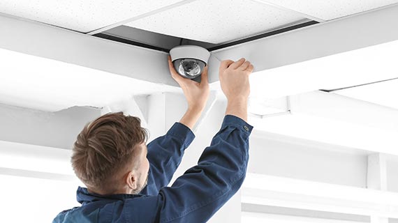 technician installing poe camera