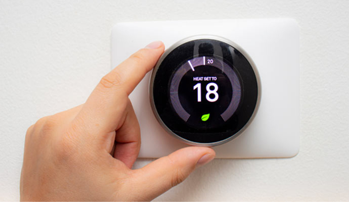 Smart thermostat mounted on the wall