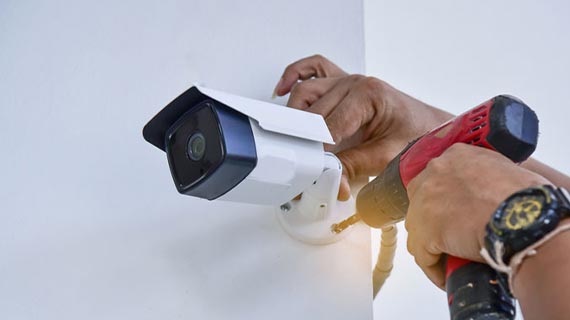 technician installing cctv camera